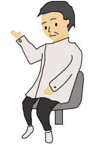 診察する医師